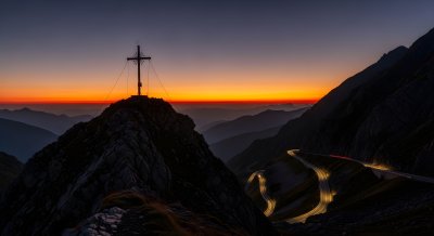 Mountain Peak Cross and Winding Road Sunset Wallpaper 4K HD