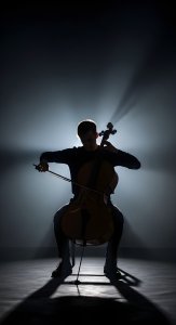 Dramatic Cello Performance Aesthetic Wallpaper HD 4K - Musical Artist Silhouette
